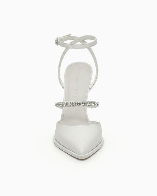 White pointed-toe heels with ankle strap and crystals, front view